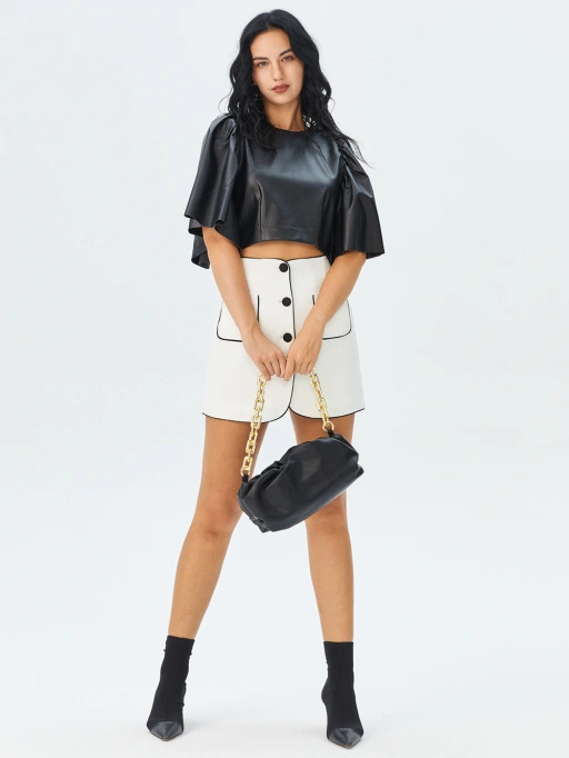 Professional Ghost Mannequin to Model for Womens Clothing with Black Model featuring Black Model wearing Cropped Tops in Minimalist White Studio, Edgy style.