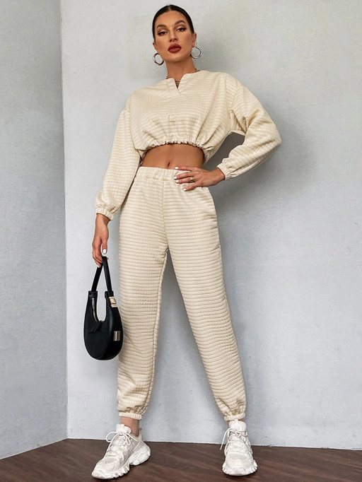 Professional Put Clothes on Model AI for Tracksuit with Black Model featuring Black Model wearing Tracksuit in Minimalist Studio, Relaxed and Professional style.